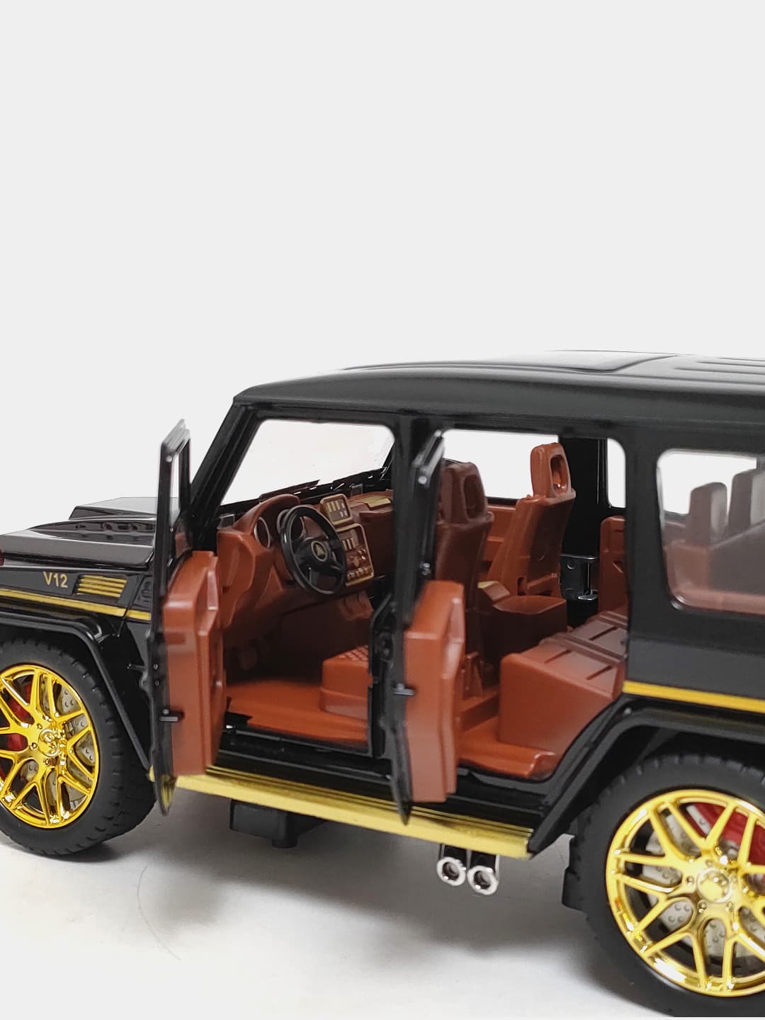 Коллекционная модель Mercedes-Benz Gelandewagen G63 черный золотой 25 см. — фото 4