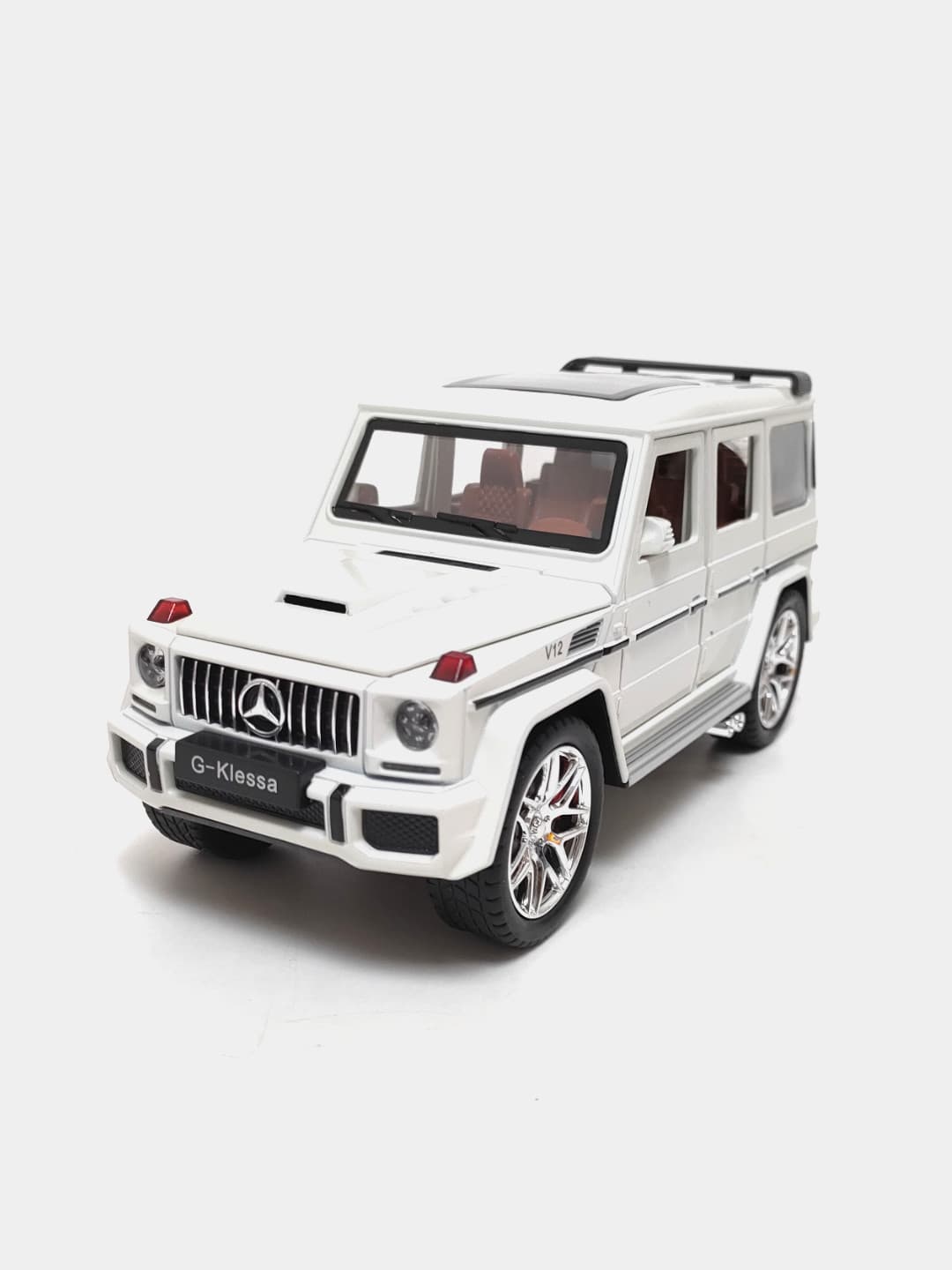 Коллекционная модель Mercedes-Benz Gelandewagen G63 черный золотой 25 см. — фото 5