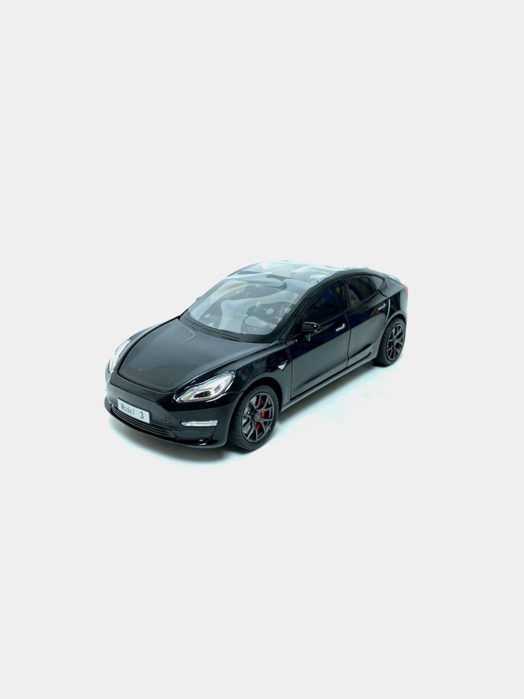 Детская модель Tesla Model 3 1:24 черный с красным коллекционная 20 см.
