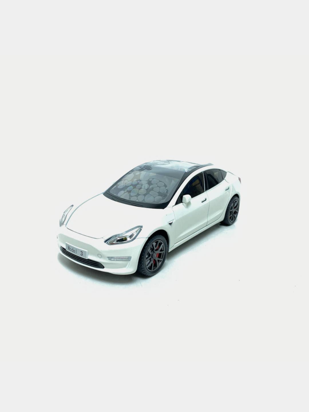 Детская модель Tesla Model 3 1:24 черный с красным коллекционная 20 см. — фото 3